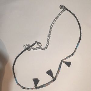 Pura vida necklace.